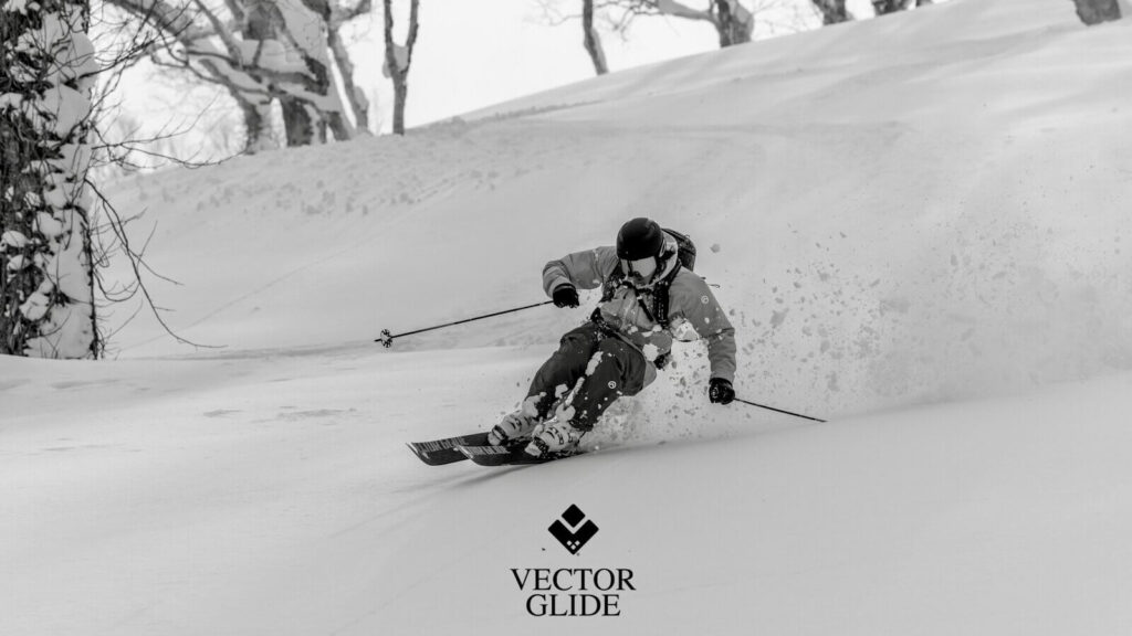 Vector Glide athlete freeskiing in deep powder