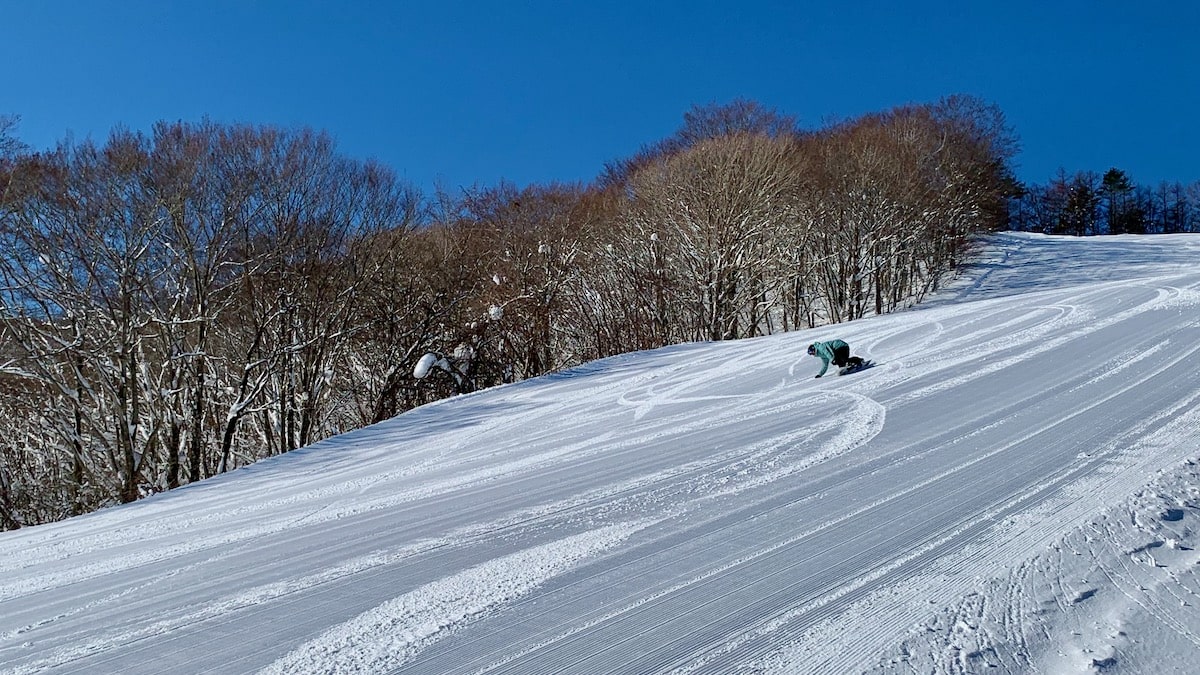 Local snowboarder riding the Technical course at Kunimidaira