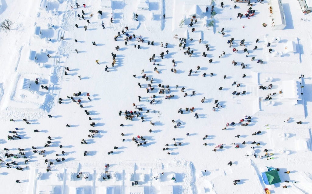 Ariel view of festival-goers to see the snow sculptures during the Inukko Festival