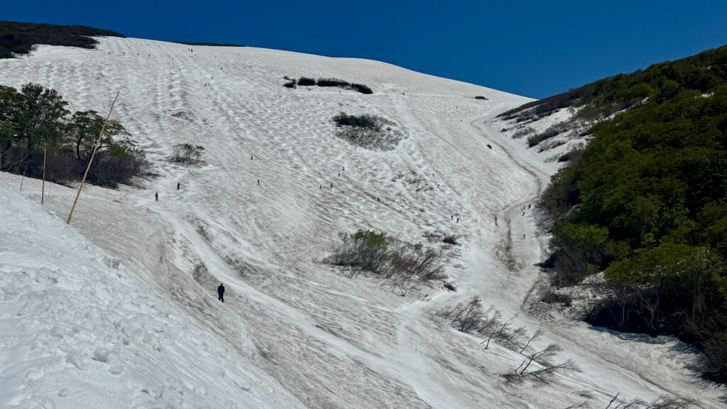 Looking up at the Daishamen (left) and Sawa (right) trails from the runout