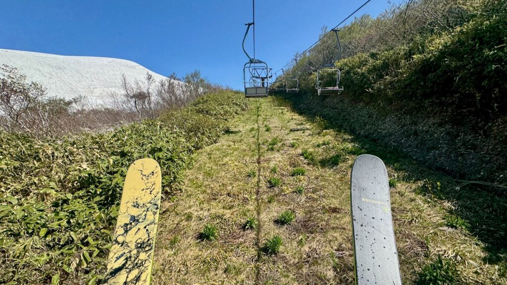 The odd feeling of wearing skis over green grass never got old
