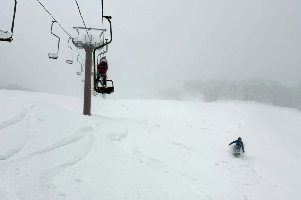 Deep powder right off the lift at Seki Onsen